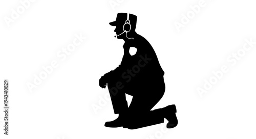 Silhouette of a police officer kneeling with headset, ready for action