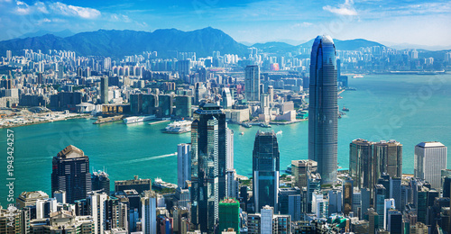 Homg Kong, Iconic Hong Kong city skyline and Victoria Harbour at daylight.