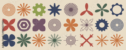 Assortment of abstract geometric shapes and symbols in muted colors on a textured background