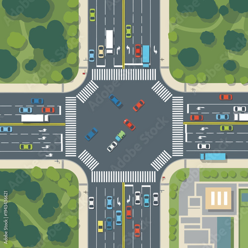 Busy City Intersection with Traffic and Pedestrian Crosswalks - Aerial View