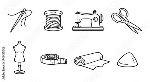 Sewing equipment and materials arranged on dark background