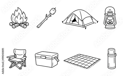 Camping tent fire and picnic gear arranged on gray background