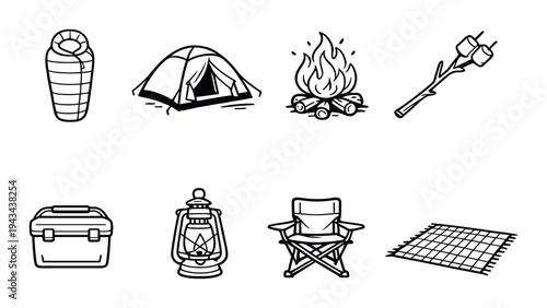 Camping items including tent fire and cooler on dark background