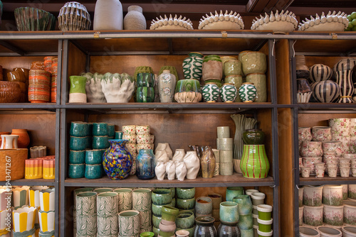 Collection of flower vases and plant pots at garden shop in spring.