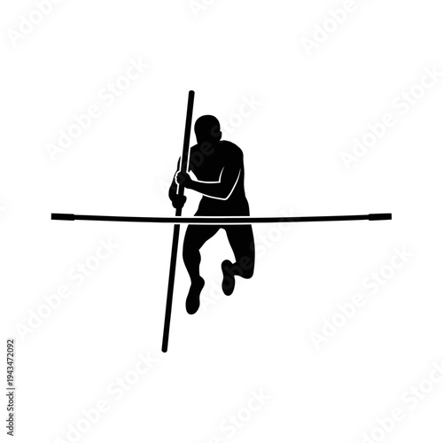 Silhouette of an athlete pole vaulting over a high bar, showcasing athletic strength and movement