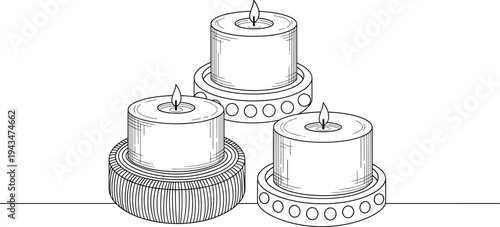 Three lit candles on decorative holders black and white line burning candles