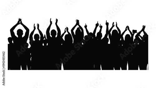 A group of people with their hands raised in the air