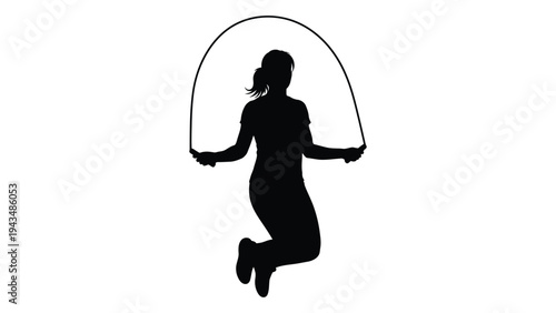 A woman jumping rope in a dynamic pose