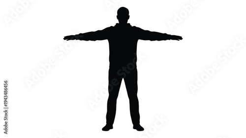 A man standing with arms outstretched