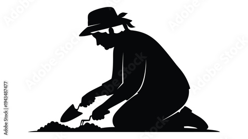 A person kneeling and digging with a shovel