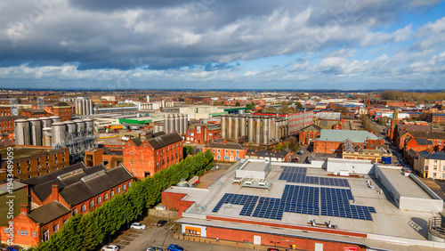 Aerial landscape of industrial brewery factory with solar panels