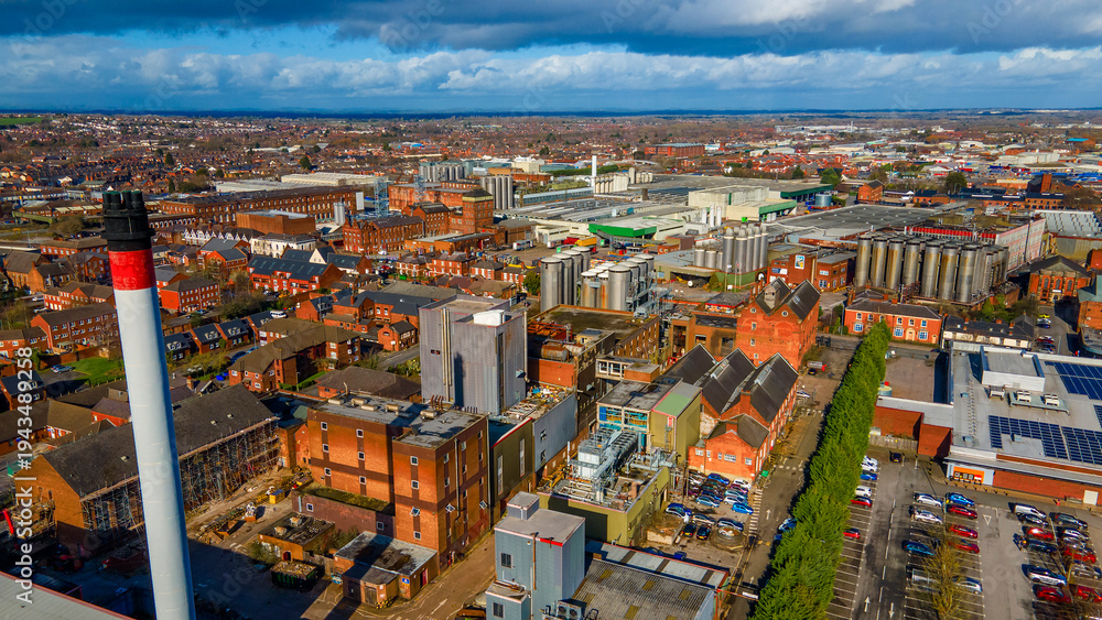 Obraz premium Aerial landscape of industrial brewery district and town horizon