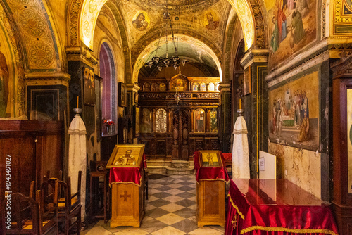 Картината върху платно Interior of Ornate Byzantine Greek Orthodox Church with Frescoes and Icons