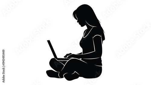 Woman sitting cross-legged and using a laptop
