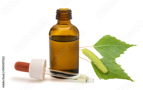 Obraz na plátne Birch branch with catkin and glass dropper bottle, natural herbal extract concep