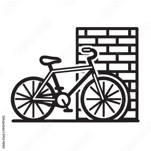 A bicycle is parked beside a brick wall in an urban setting.