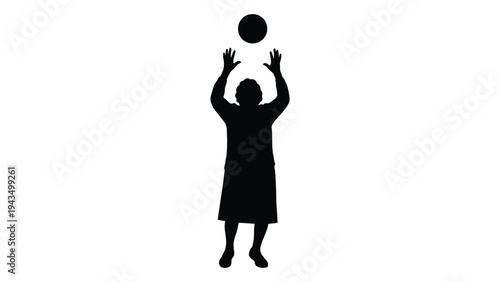 A person in a dress jumping up to catch a ball