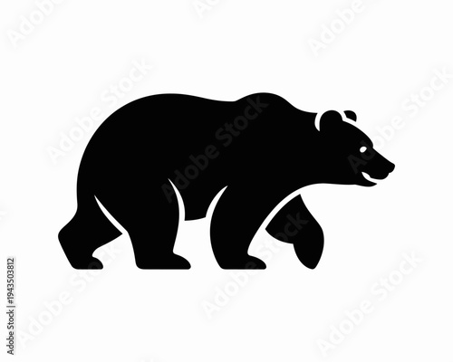 Black silhouette of a walking bear.