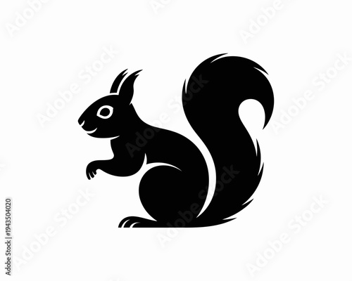 Black silhouette of a sitting squirrel.
