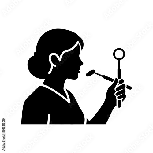 Dentist holding dental mirror tool.