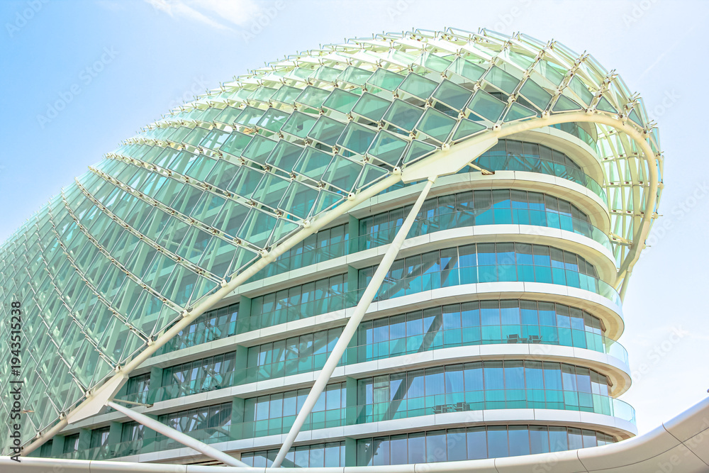 Fototapeta premium Abu Dhabi, United Arab Emirates- April 22, 2013: glass architecture of Yas Viceroy on Abu Dhabi's Yas Island. 5-star luxury Resort Hotel is located on Yas Marina Circuit, the racetrack for Formula 1.