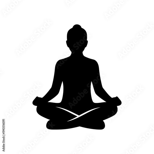 Person meditating in lotus position.