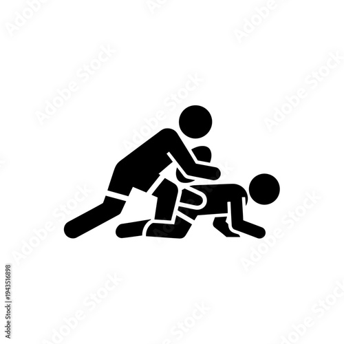 Two people engaged in wrestling match.