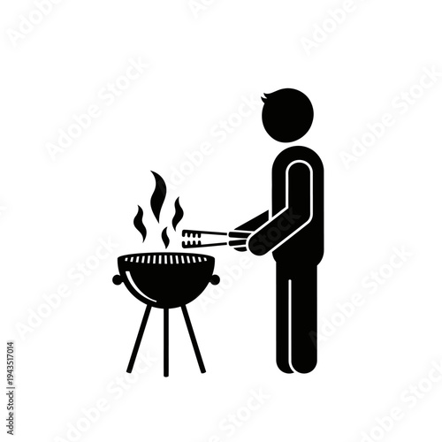 Man grilling food on barbecue.