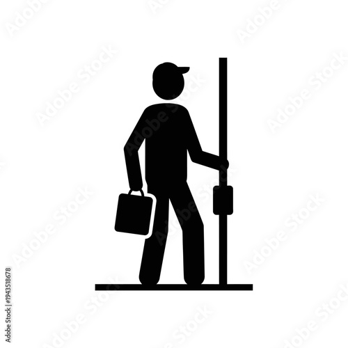 Man in cap with briefcase standing.