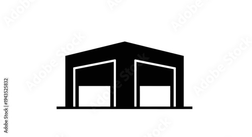 Industrial warehouse building with two large roller doors.