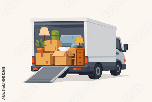 Flat vector illustration of a white moving truck with an open back and ramp, packed with cardboard boxes, furniture, a sofa, and lamps, ideal for home relocation and logistics service concepts.
