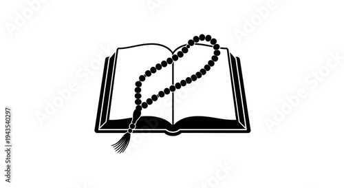 Holy book with prayer beads.