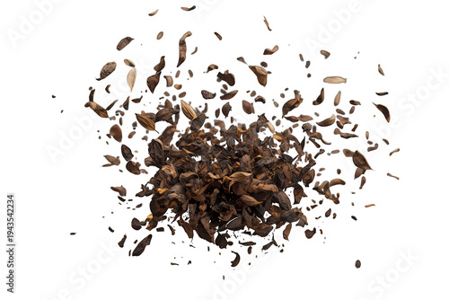 Dry tea leaves flying, dropping into a splash, creating an explosion of organic brown ingredients on transparent background
