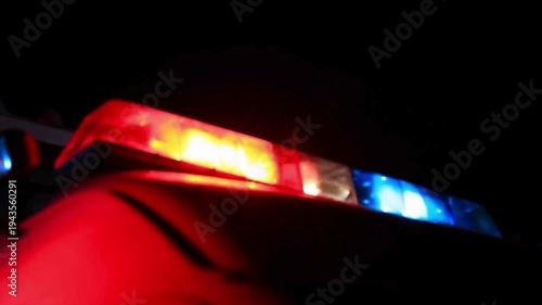 Police Car Lights Flashing at Night.