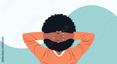 Back view of a person with a large afro hairstyle resting their hands behind their head in a relaxed and confident pose.
