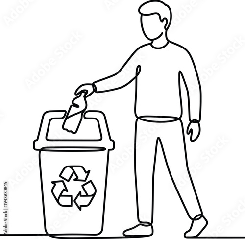 Man putting earth day symbol paper in recycling bin on earth day