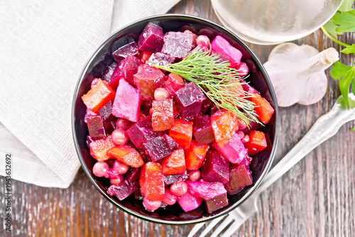 Salad of beetroot and green pea on board top