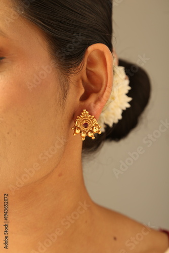 Indian woman image on white background wearing Indian jewellery