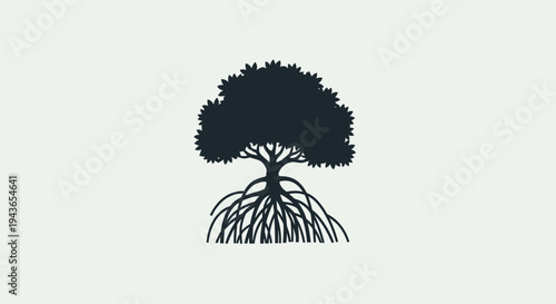 Black silhouette of a tree with roots.