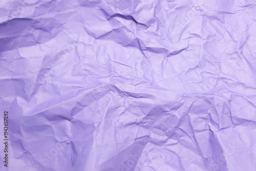 Abstract purple crumpled and creased recycle paper texture background