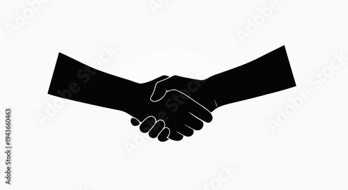 Silhouette of two hands in a firm handshake, symbolizing agreement and partnership