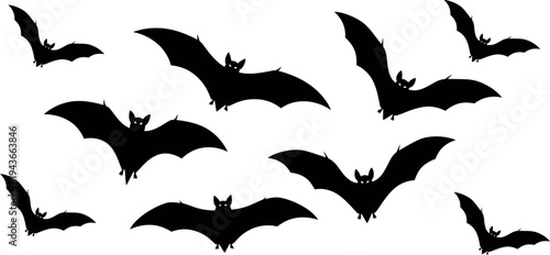 Collection of flying black bat silhouettes on white background