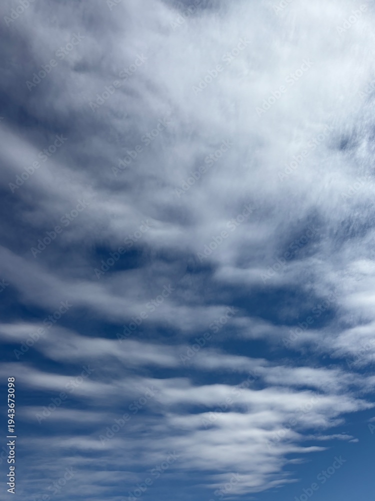 Fototapeta premium Dramatic White Cloud Texture Pattern Against Deep Blue Sky