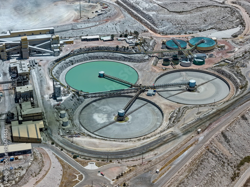 Aerial view of a copper concentrator plant with flotation and thickening ponds for separating minerals