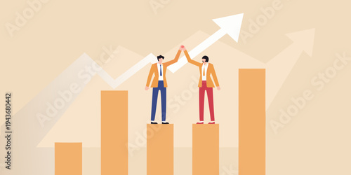 Two business professionals celebrating success with upward trending graph