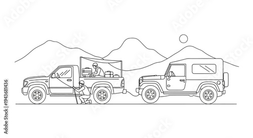 Off-road adventure: Two rugged vehicles, one towing the other, in a desert landscape with mountains.