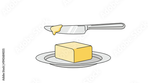 Square block of yellow butter sits on a white plate while a silver butter knife holds a small spreadable piece of the product.