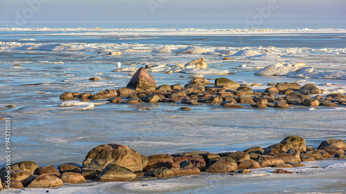 Frozen seascape at the beach in winter