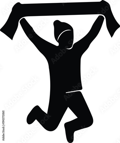 Black silhouette of a jumping soccer supporter holding a scarf above the head while celebrating a goal in the stadium. Representation of passionate football fan culture.