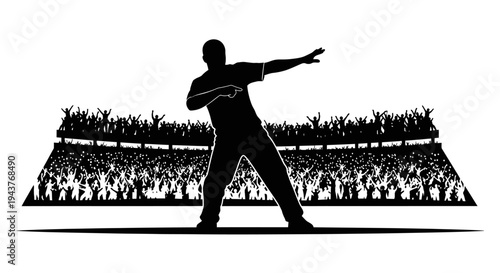 Silhouette of a Dancer Performing in Front of a Cheering Crowd at a Stadium